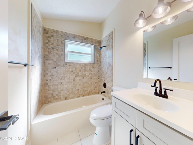 full bathroom with tile patterned floors, vanity, vaulted ceiling, toilet, and tiled shower / bath