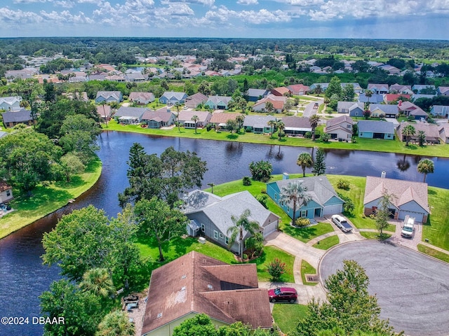 drone / aerial view with a water view