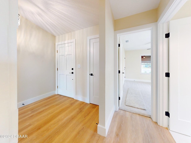 hall featuring hardwood / wood-style flooring