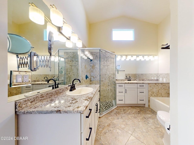 full bathroom with vanity, vaulted ceiling, separate shower and tub, tile patterned flooring, and toilet