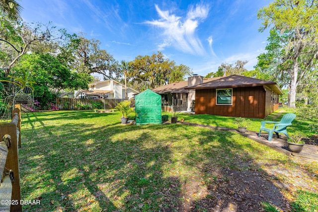 view of yard with fence