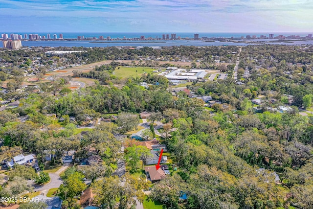 birds eye view of property featuring a water view