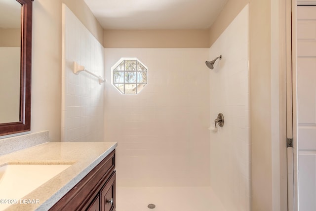 2017 Cornell Pl, Port Orange, FL 32128 - bathroom featuring vanity and a tile shower