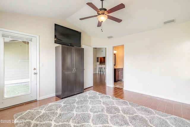 2017 Cornell Pl, Port Orange, FL 32128 - bedroom featuring lofted ceiling, wood finished floors, and a ceiling fan