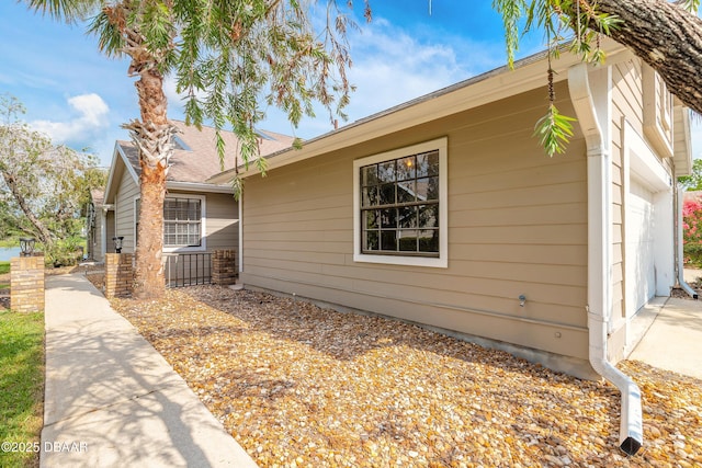 2017 Cornell Pl, Port Orange, FL 32128 - view of side of home featuring driveway