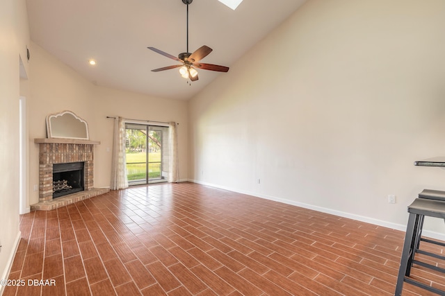 2017 Cornell Pl, Port Orange, FL 32128 - unfurnished living room with high vaulted ceiling, ceiling fan, a fireplace, dark wood-type flooring, and recessed lighting