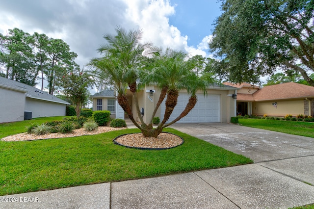 ranch-style home featuring a garage and a front lawn