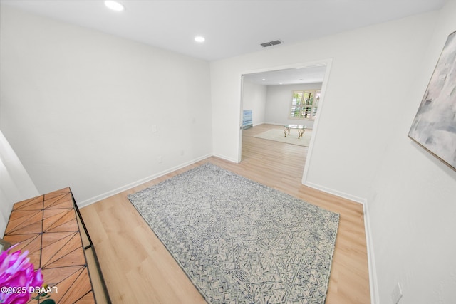 81 Alberta Ave, Ponce Inlet, FL 32127 - corridor featuring wood finished floors and recessed lighting