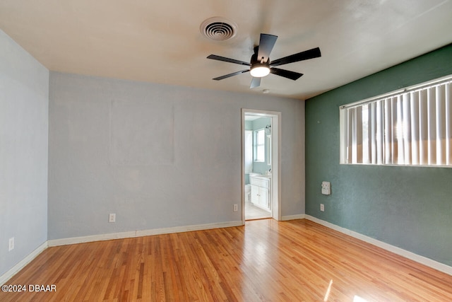 unfurnished room featuring ceiling fan and light hardwood / wood-style floors