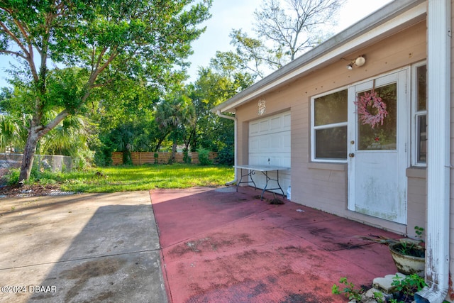 view of patio with a garage