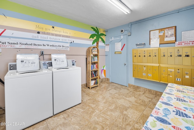 laundry area featuring washing machine and dryer