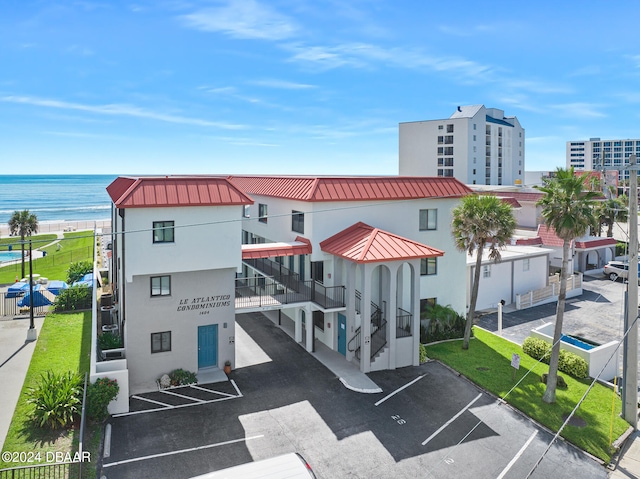 view of building exterior with a water view