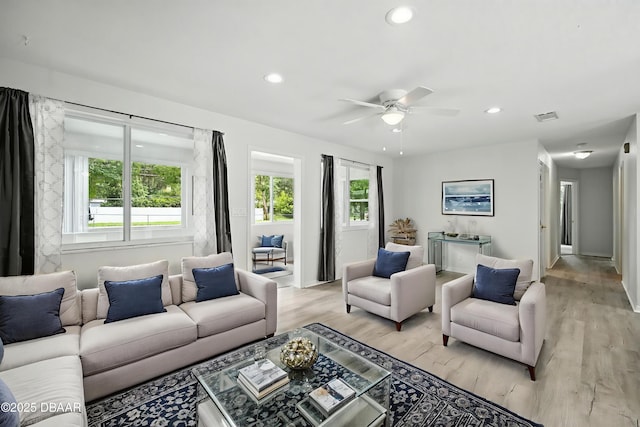 1101 8th St, Daytona Beach, FL 32117 - living area with plenty of natural light, light wood finished floors, a ceiling fan, and recessed lighting