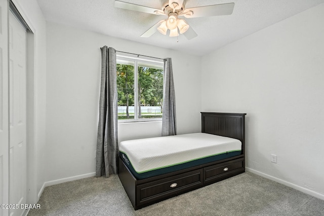 1101 8th St, Daytona Beach, FL 32117 - bedroom with carpet flooring, ceiling fan, and a closet