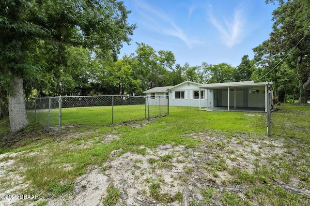 1101 8th St, Daytona Beach, FL 32117 - view of yard featuring an attached carport