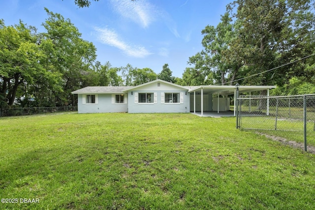 1101 8th St, Daytona Beach, FL 32117 - back of house with an attached carport