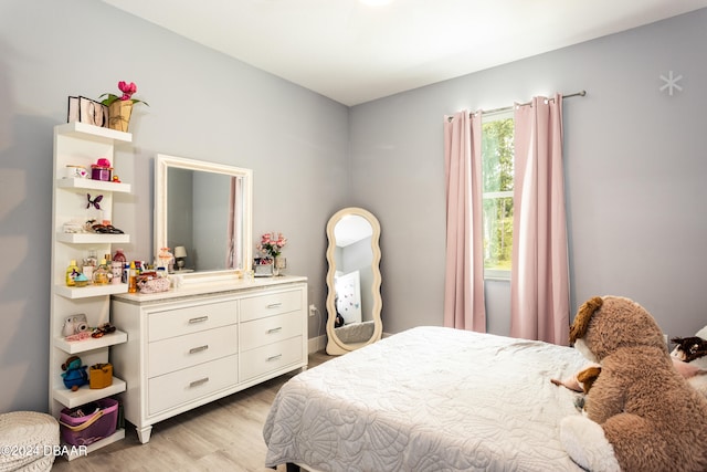 bedroom featuring light wood-type flooring