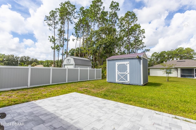 view of outbuilding with a yard