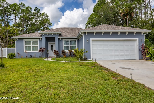 ranch-style house featuring a garage and a front yard