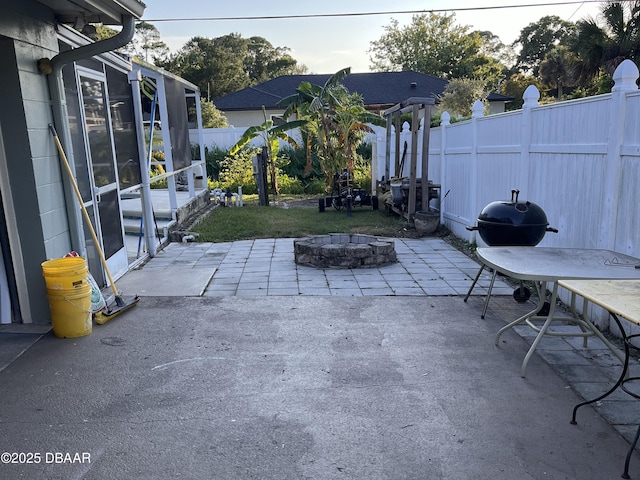 view of patio / terrace featuring an outdoor fire pit and area for grilling