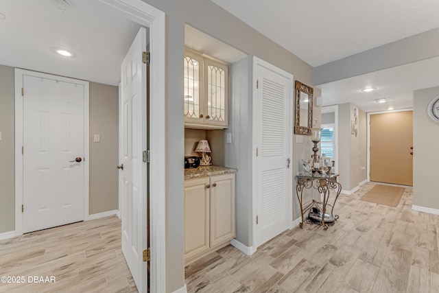 hallway featuring light hardwood / wood-style flooring