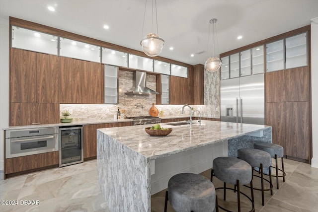 43 Del Palma Dr, Palm Coast, FL 32137 - kitchen with wall chimney exhaust hood, beverage cooler, appliances with stainless steel finishes, a sink, and backsplash
