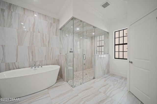 43 Del Palma Dr, Palm Coast, FL 32137 - full bathroom with crown molding, a freestanding bath, a stall shower, marble finish flooring, and tile walls