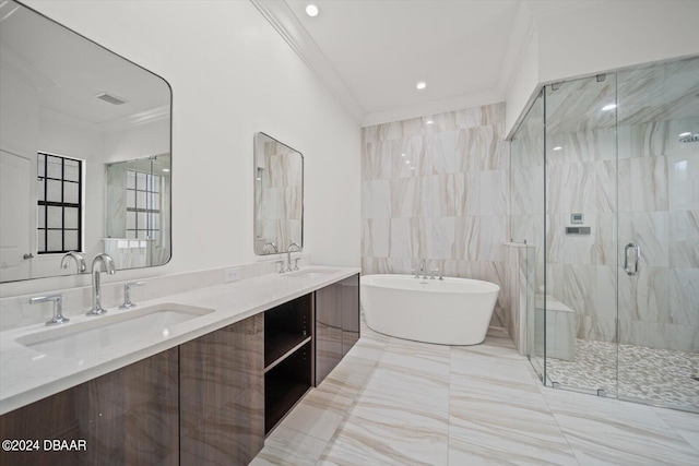 43 Del Palma Dr, Palm Coast, FL 32137 - full bath with ornamental molding, a freestanding tub, a stall shower, double vanity, and tile walls