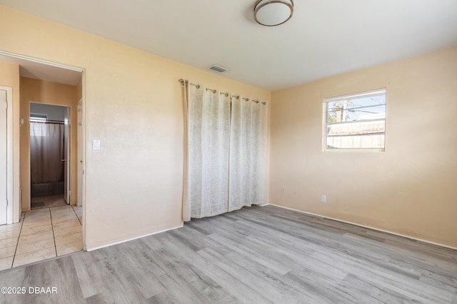 unfurnished bedroom featuring light hardwood / wood-style floors