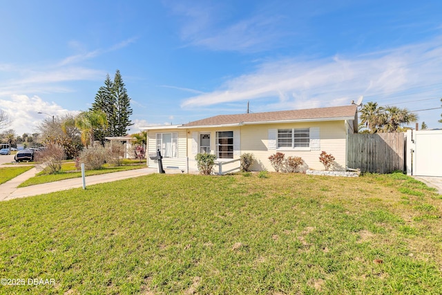 ranch-style house with a front yard