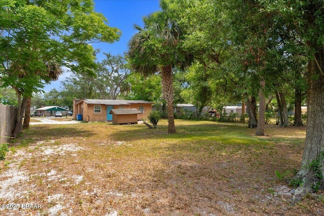 view of yard featuring fence