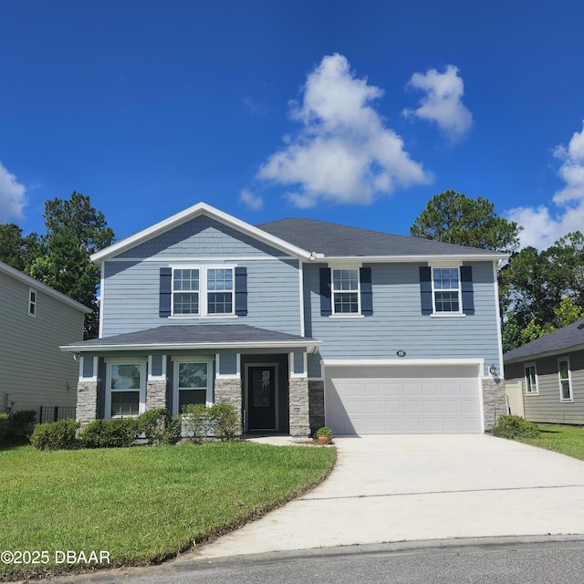 153 Orient Dr, Saint Augustine, FL 32092 - craftsman house with stone siding, a garage, driveway, and a front yard