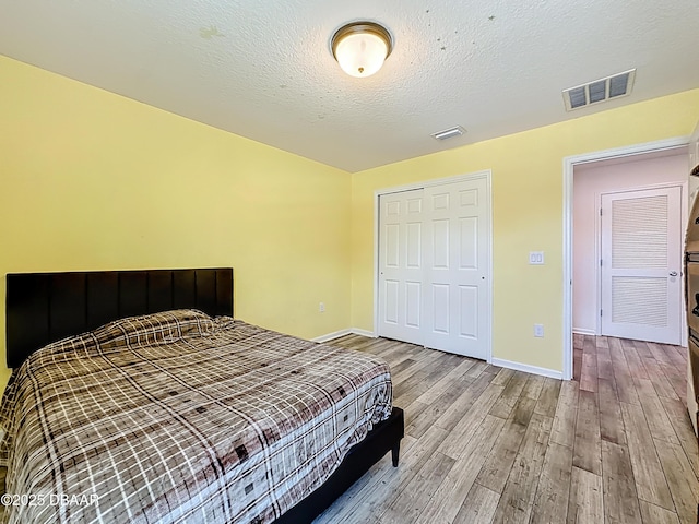153 Orient Dr, Saint Augustine, FL 32092 - bedroom featuring light wood finished floors and a closet