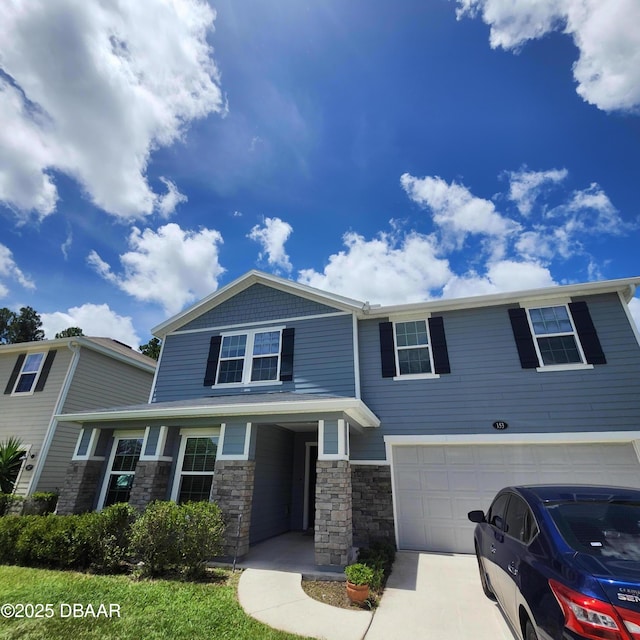 153 Orient Dr, Saint Augustine, FL 32092 - craftsman-style home featuring concrete driveway and a garage