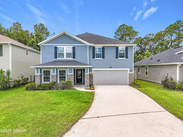 153 Orient Dr, Saint Augustine, FL 32092 - craftsman-style home with a garage, concrete driveway, a front lawn, and stone siding
