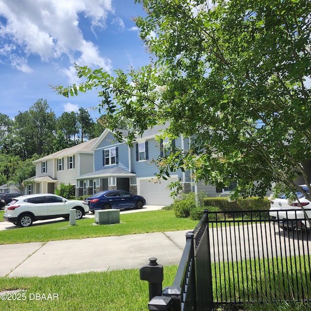 153 Orient Dr, Saint Augustine, FL 32092 - view of yard featuring concrete driveway and a garage
