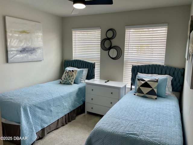 carpeted bedroom featuring a ceiling fan