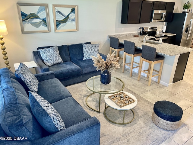 living area featuring light tile patterned floors