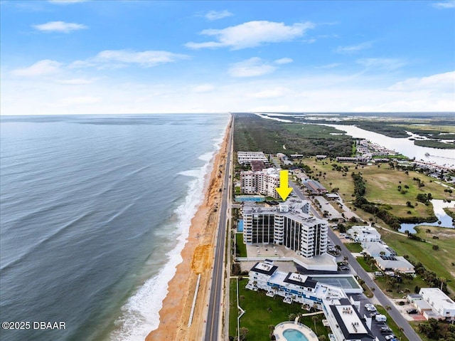 aerial view featuring a water view and a view of the beach