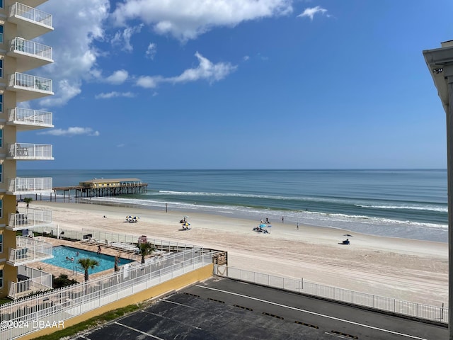 property view of water featuring a beach view