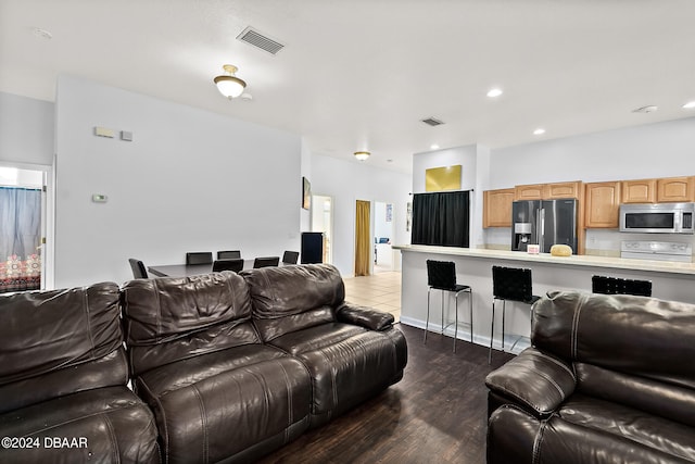 living room featuring dark hardwood / wood-style flooring