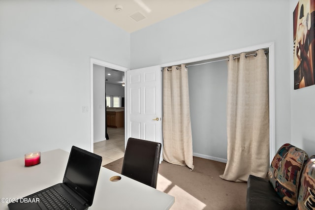 home office featuring light tile patterned floors