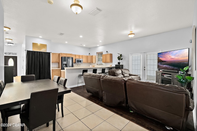 living room featuring light tile patterned floors