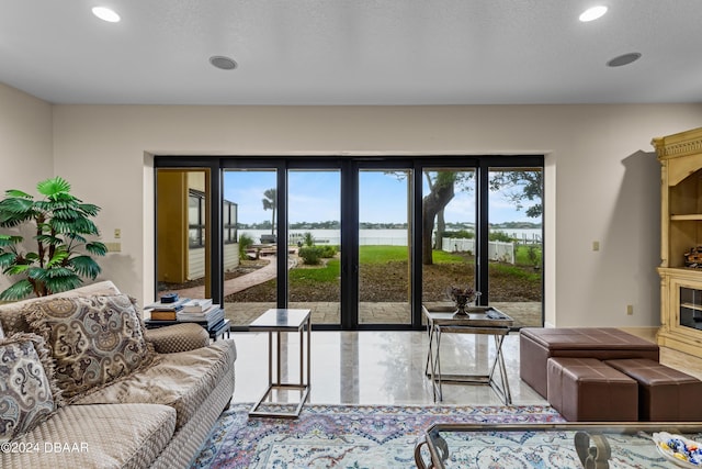 living room featuring a water view