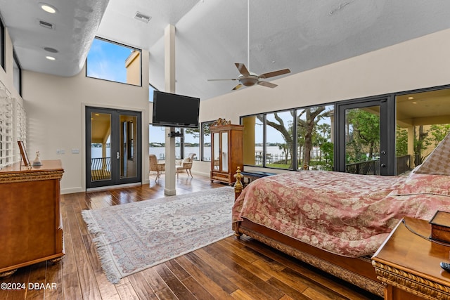 bedroom with french doors, ceiling fan, access to exterior, a textured ceiling, and wood-type flooring