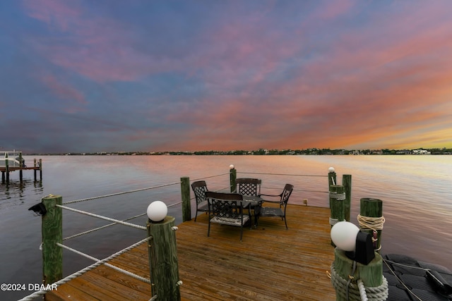 dock area featuring a water view