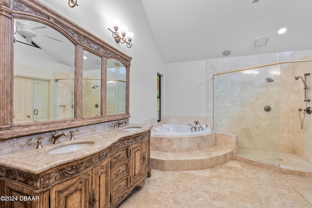 bathroom with tile patterned floors, vanity, independent shower and bath, and vaulted ceiling