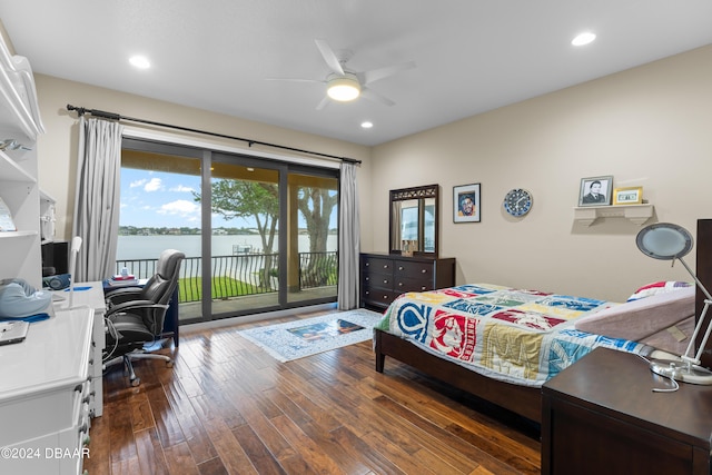 bedroom with access to outside, ceiling fan, a water view, and dark hardwood / wood-style floors