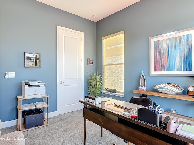 office area with carpet flooring and baseboards