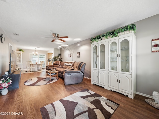 708 Egret Ct, Edgewater, FL 32141 - living area with a chandelier, ceiling fan, wood finished floors, and baseboards